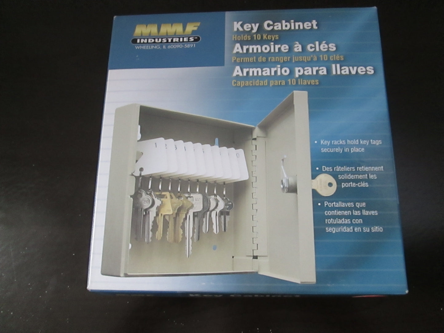 Box packaging for an MMF 10 Key Cabinet, showing the product with a key lock and two keys, accompanied by images of the cabinet in gray color.