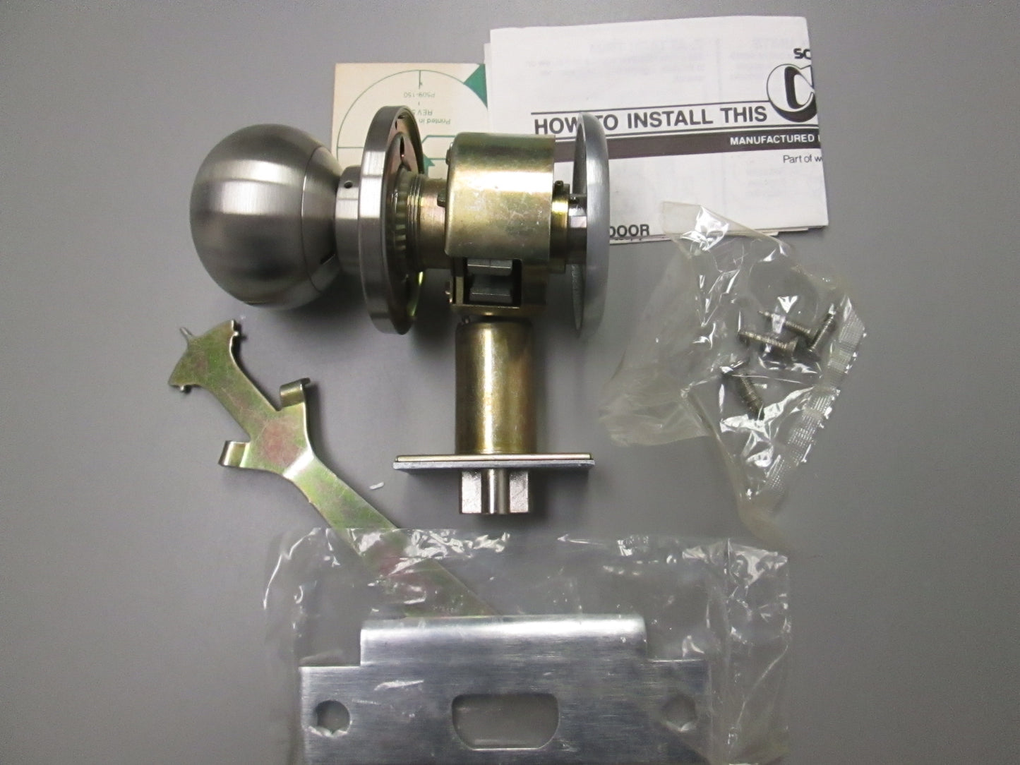 Schlage D25D Exit ONLY Set with Orbit Style Knob Brushed Stainless