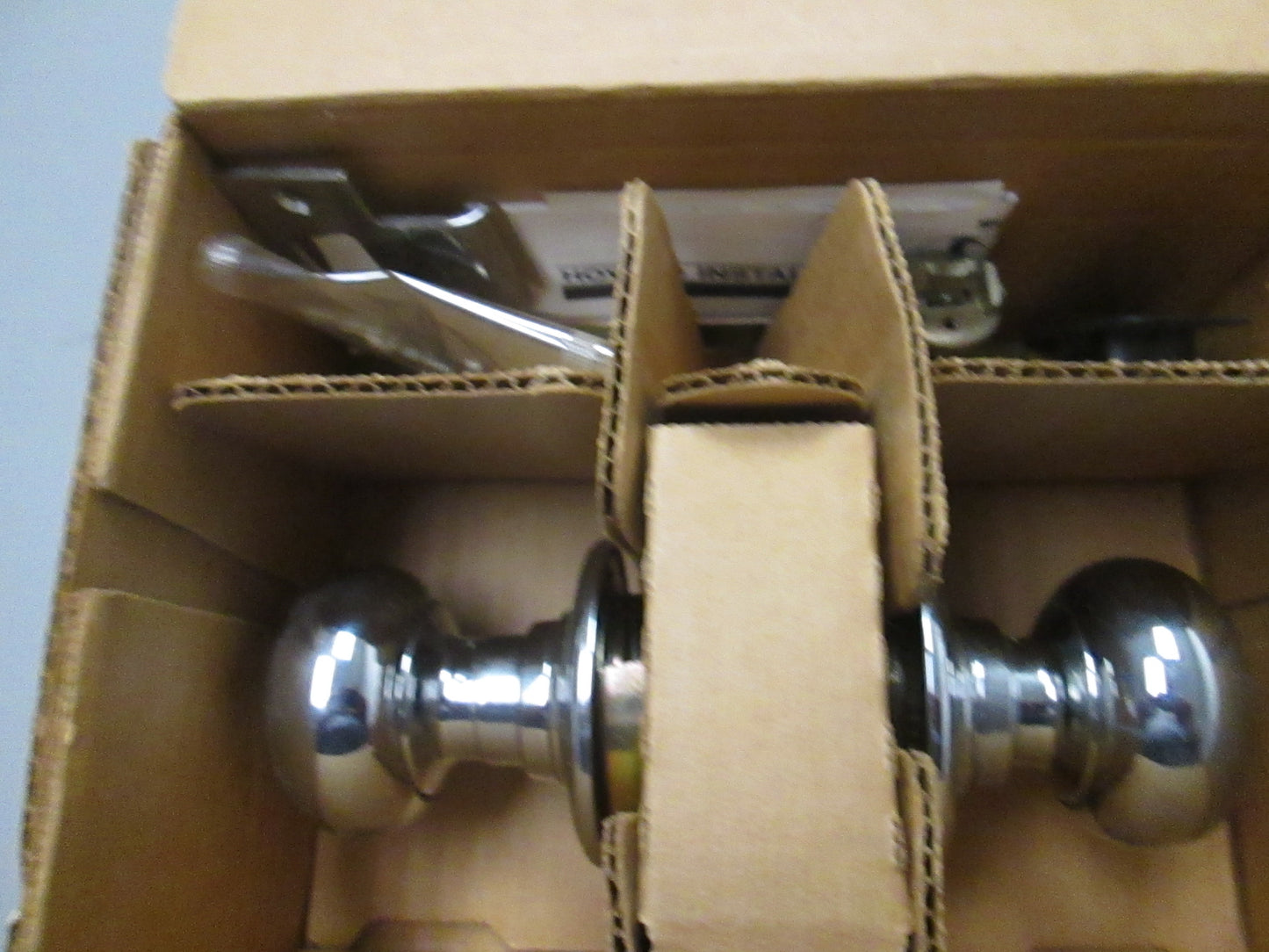 Schlage D10S Passage Set with Orbit Style Knobs Polished Chrome