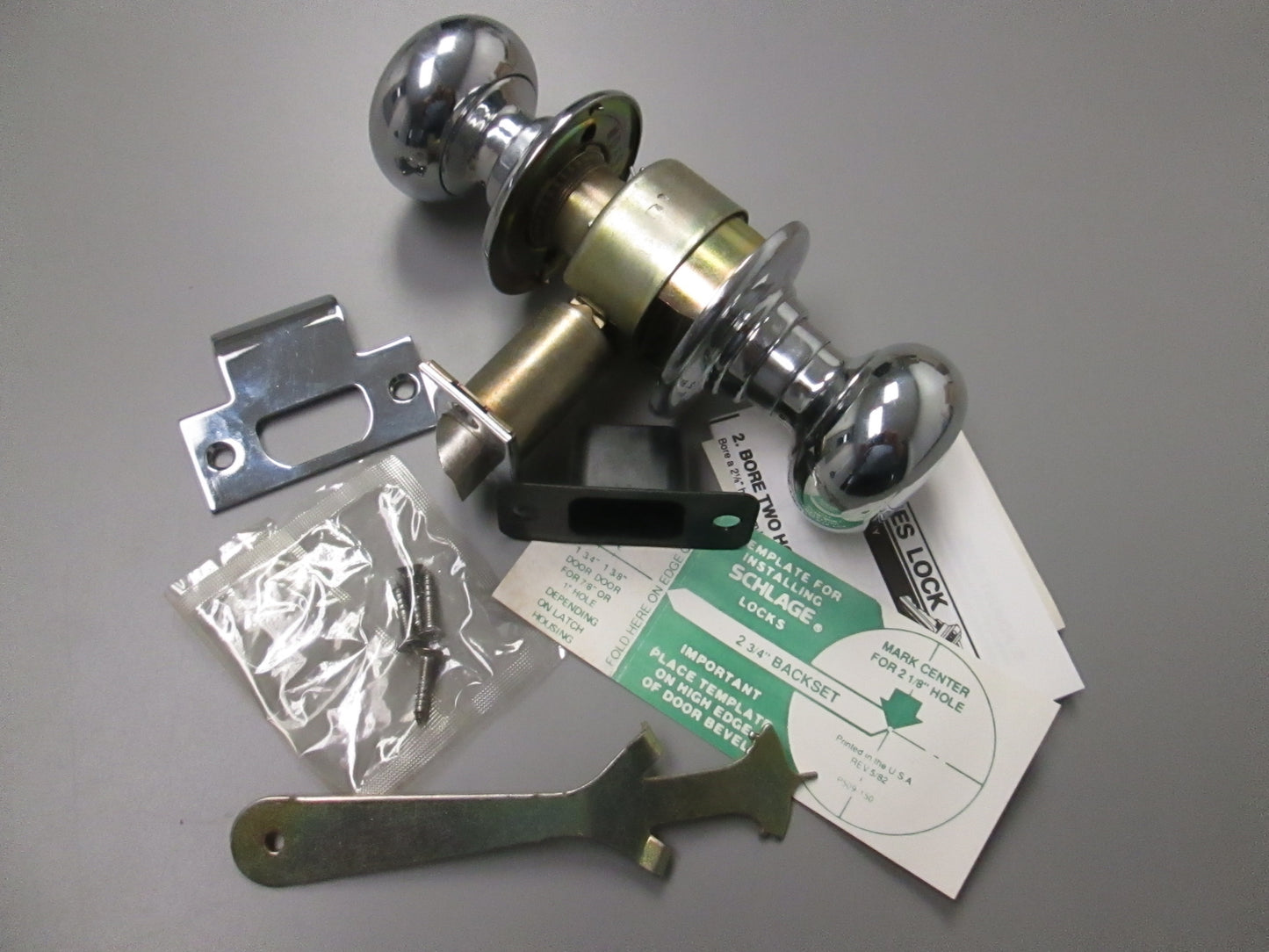 Schlage D10S Passage Set with Plymouth Style Knobs Polished Chrome