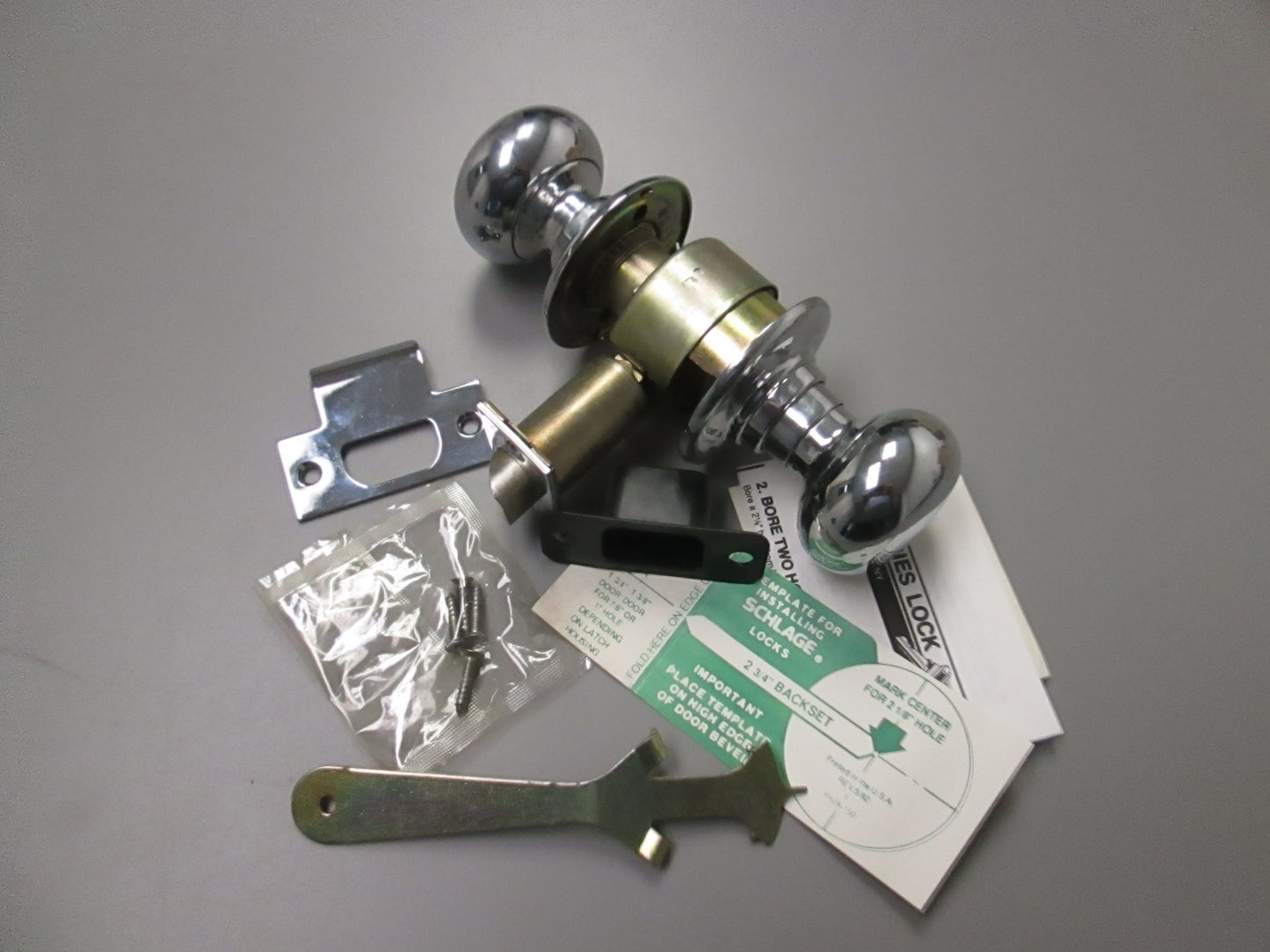 Schlage D10S Passage Set with Plymouth Style Knobs Polished Chrome