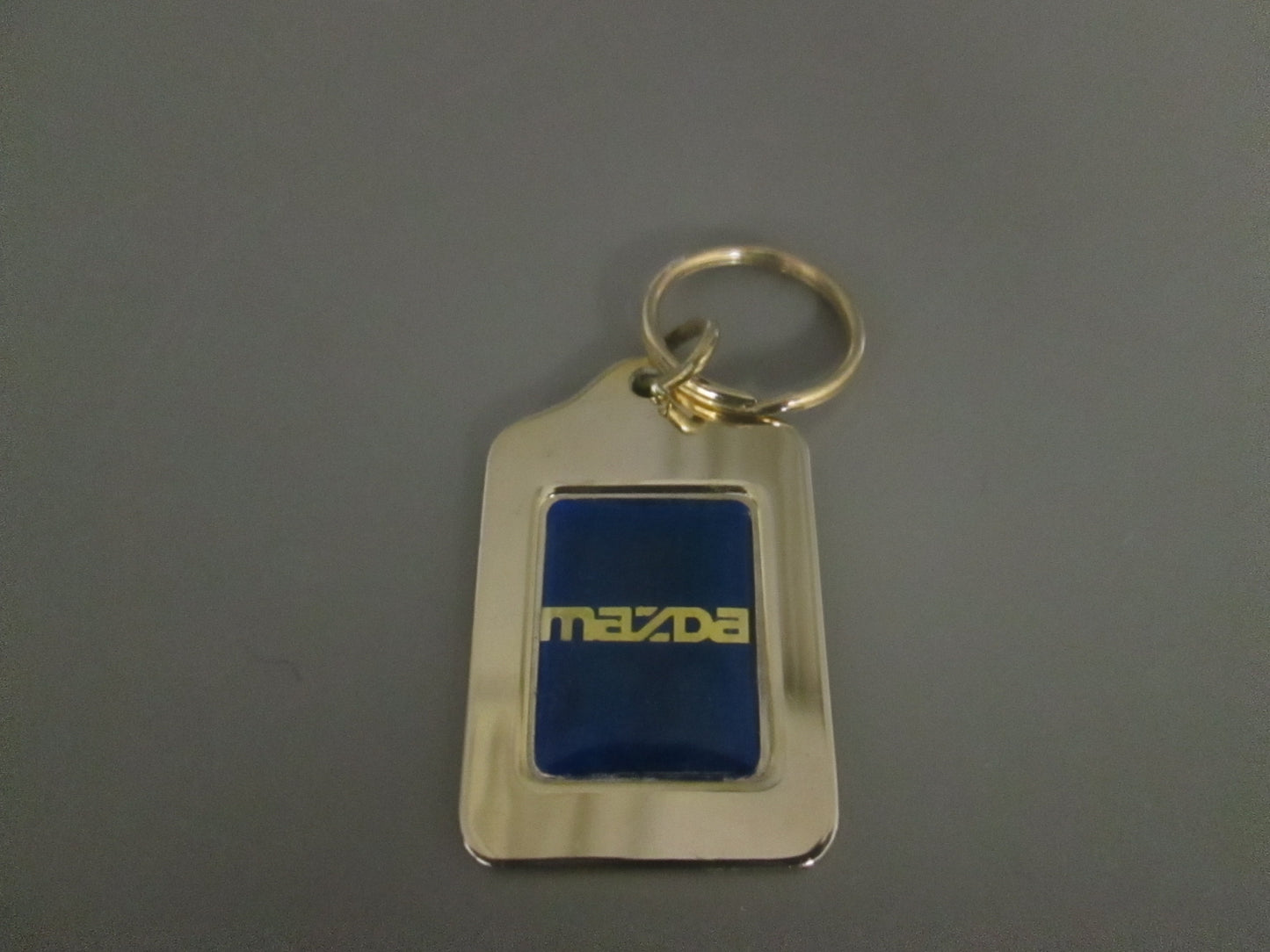 Brass Key Fob with Mazda Logo Blue