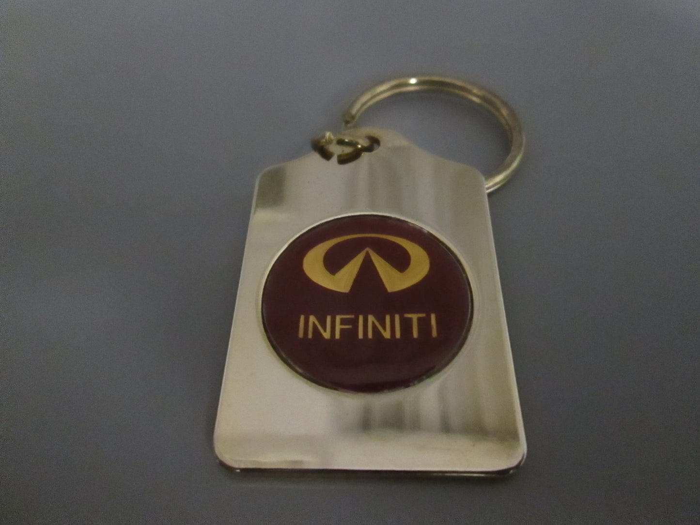 Brass Fob with Infiniti Logo