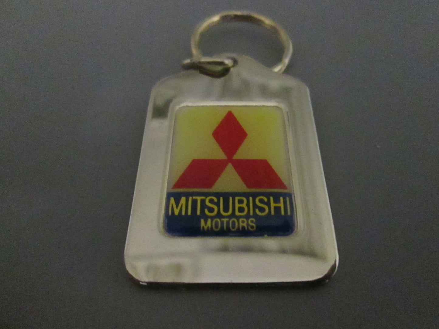 Brass Fob with Mitsubishi Logo