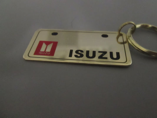 Brass License Plate with Isuzu Logo