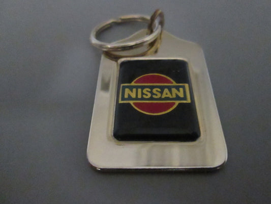 Brass Fob with Nissan Logo