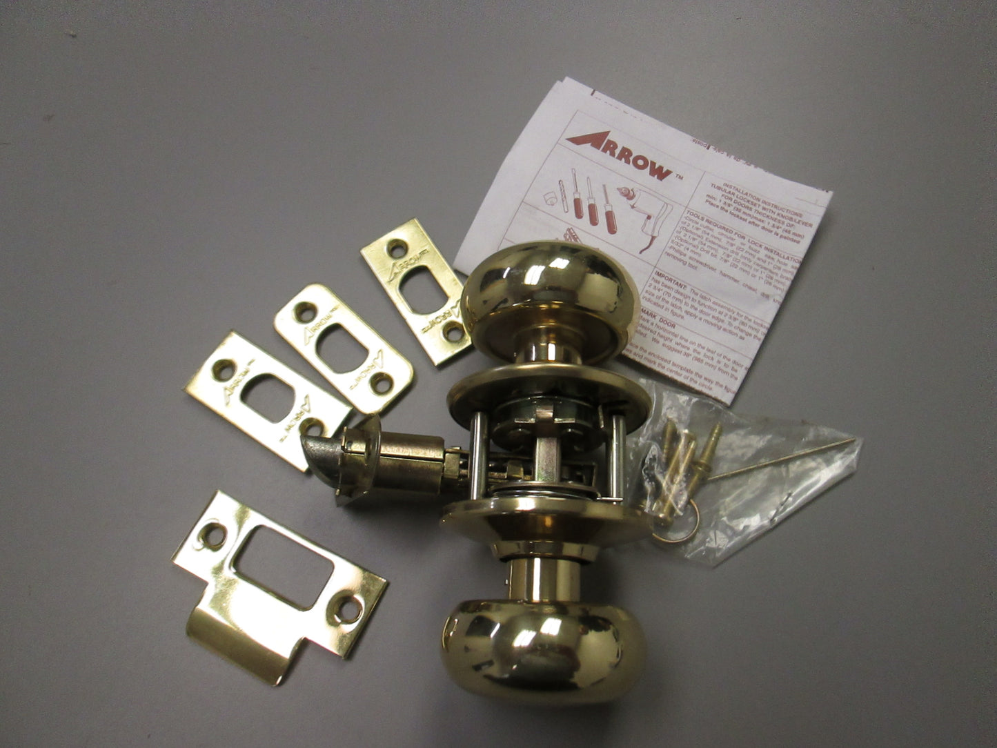 Arrow C01 Passage Set with Tudor Style Knobs Polished Brass