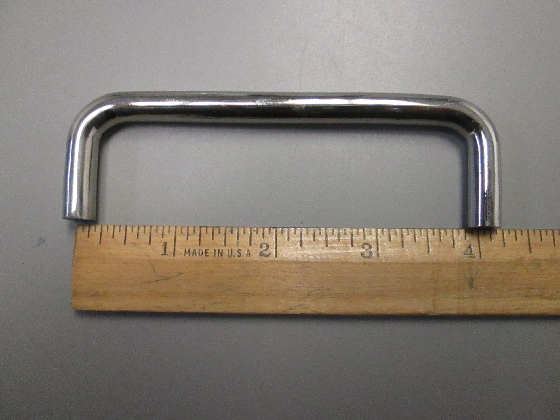 Shiny chrome wire pull. 4 inch length.